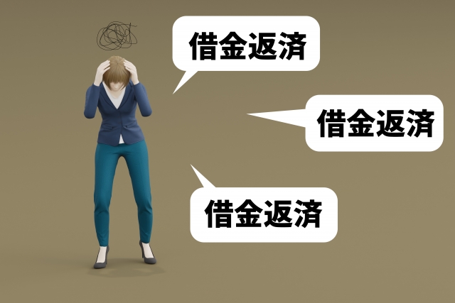 お金を手に頭を抱える。守谷市で債務整理の無料相談ができます